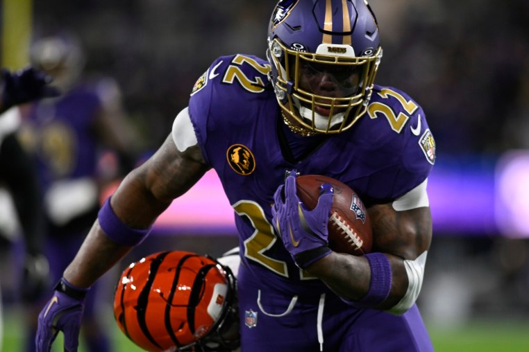 Nov 27, 2025; Baltimore, Maryland, USA; Baltimore Ravens running back Derrick Henry (22) rushes the ball against the Cincinnati Bengals during the first half at M&amp;T Bank Stadium. Mandatory Credit: Tommy Gilligan-Imagn Images