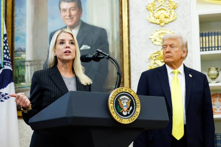 From left, Pam Bondi (speaking at a podium), and Donald Trump