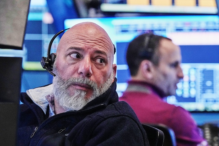 Traders on the floor of the New York Stock Exchange, Tuesday, Jan. 20, 2026. 