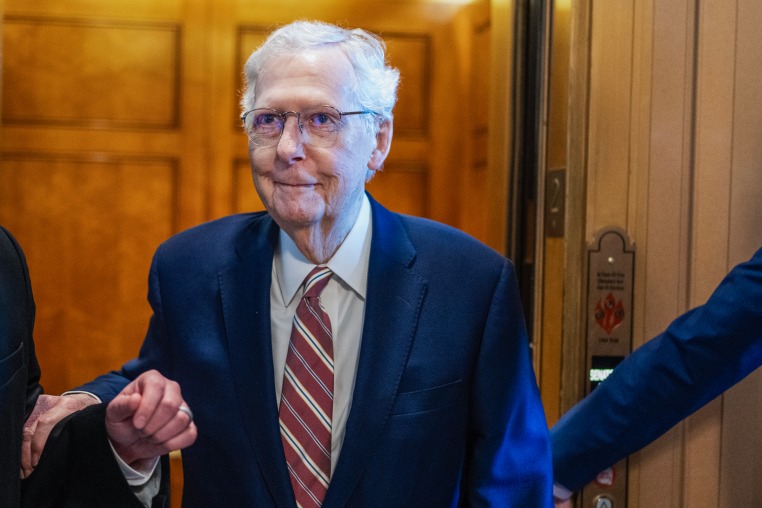 Sen. Mitch McConnell standing outside an elevator