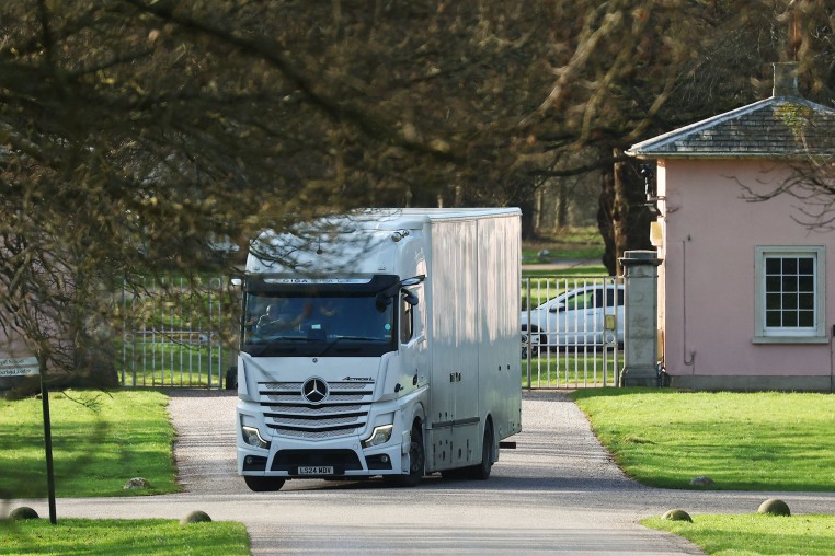 A storage van leaves the gates of Royal Lodge in Windsor Great Park, the former home of Andrew Mountbatten-Windsor, on Feb. 4, 2026 in Windsor, England.