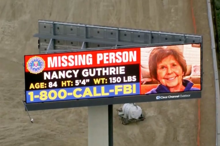 An FBI billboard in California displaying a missing person alert for Nancy Guthrie, the mother of Today show host Susannah Guthrie.