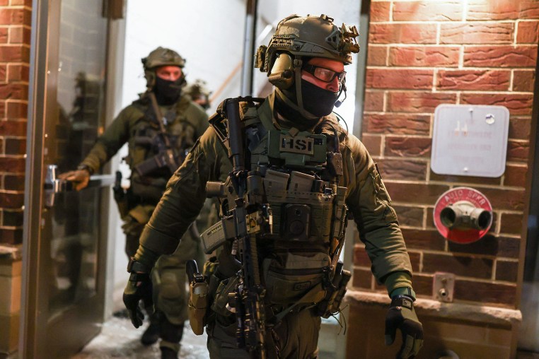 Federal agents with Homeland Security Investigations.