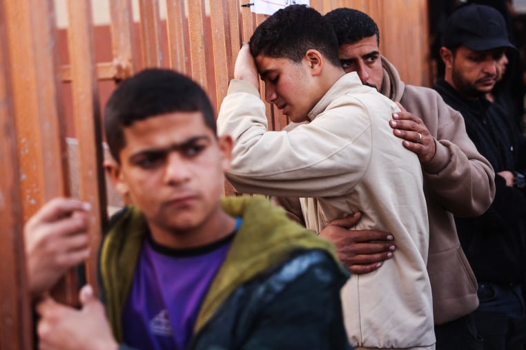 Palestinians mourners during the funeral of those killed in an overnight Israeli strike in Khan Younis, southern Gaza on Feb. 15, 2026.