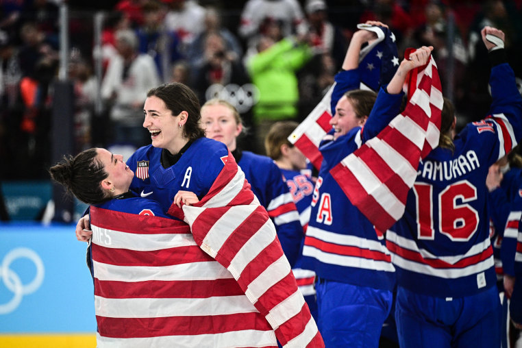 Team USA celebrates on the ice