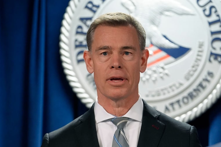 Assistant Director in Charge FBI, Washington Field Office David Sundberg, left, speaks to reporters on March 4, 2024, in Boston. 