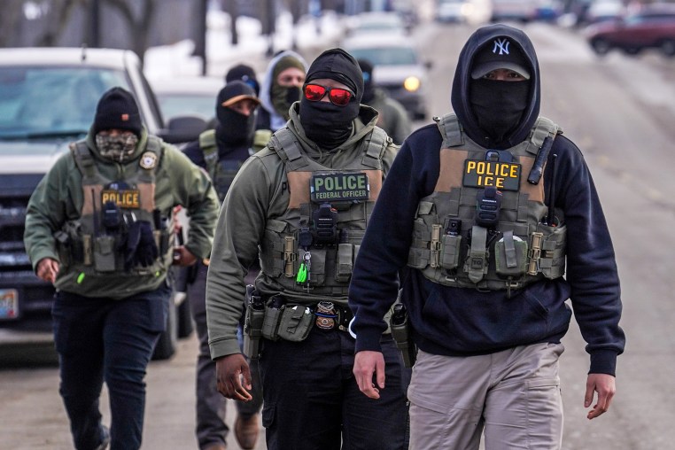 Federal agents conduct immigration enforcement operations on Feb. 5, 2026, in Minneapolis.