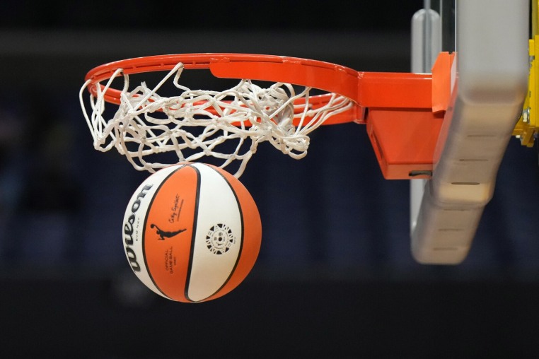 May 25, 2023; Los Angeles, California, USA; Wilson official basketball with WNBA logo goes through the net during the game between the LA Sparks and the Las Vegas Aces at Crypto.com Arena. Mandatory Credit: Kirby Lee-USA TODAY Sports