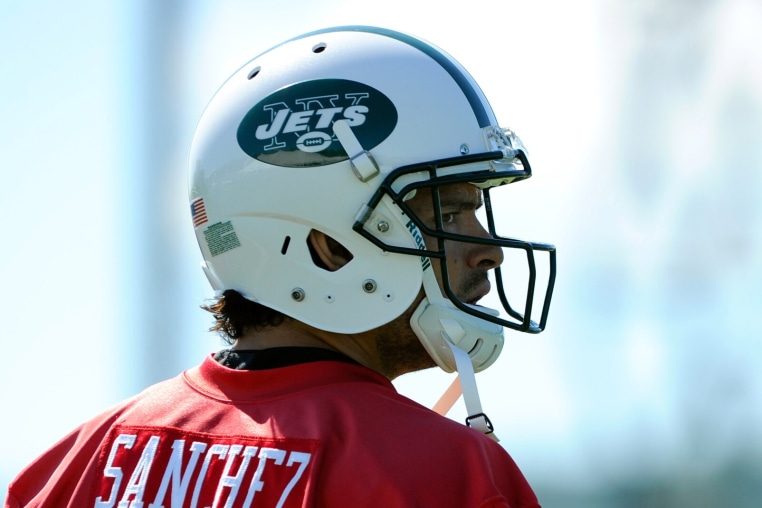 Jul 26, 2013; Cortland, NY, USA; New York Jets quarterback Mark Sanchez (6) looks on during training camp at SUNY Cortland. Mandatory Credit: Rich Barnes-Imagn Images