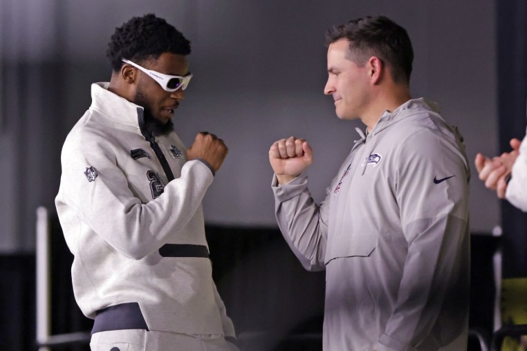 Seattle Seahawks' head coach Mike McDonald and Devon Witherspoon fist bump on stage during Super Bowl LX Opening Night at San Jose Convention Center in San Jose, Calif., on Monday, February 2, 2026. (Photo by Scott Strazzante/San Francisco Chronicle via Getty Images)