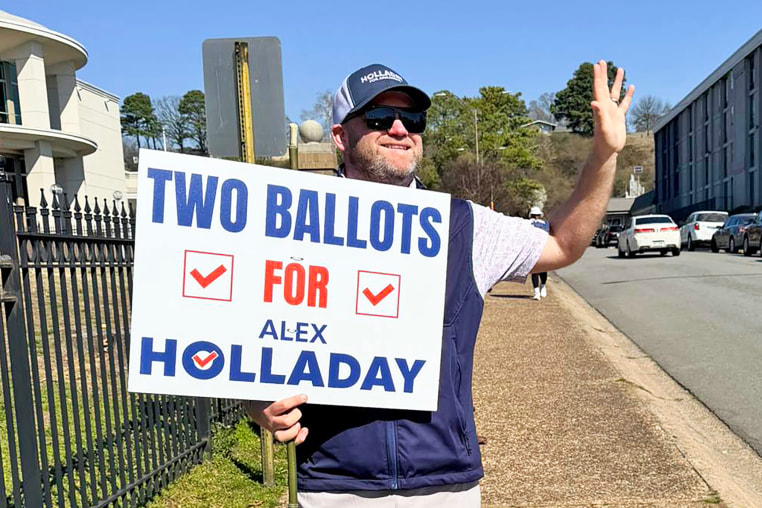 Alex Holladay campaigning.
