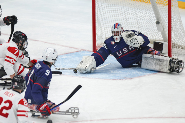 U.S. goalkeeper Jen Lee makes a save during gold medal game against Canada at the Beijing 2022 Paralympic Winter Games.