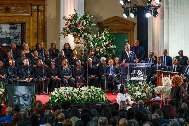 Mourners at funeral.