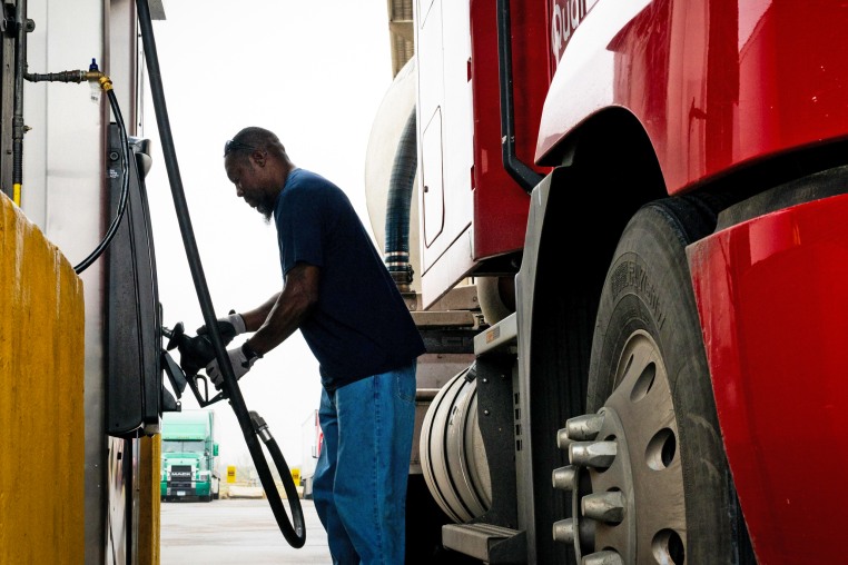 A customer fills their semi-truck at a Pilot Traveler Center on March 09, 2026 in Lockhart, Texas. 
