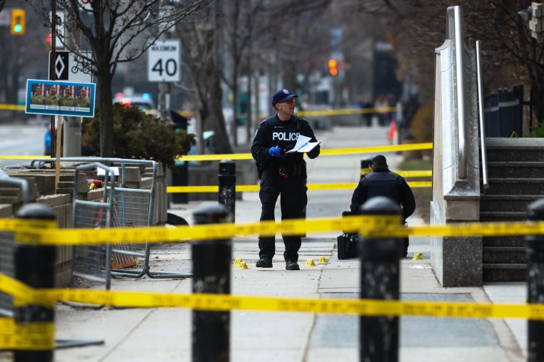 Police at the scene after shots were fired at the U.S. Consulate in Toronto on March 10, 2026. 