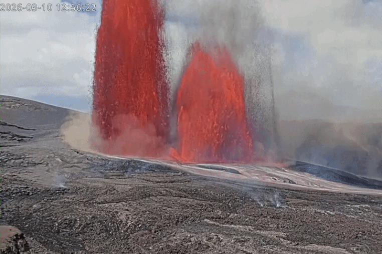 Hawaii's Kilauea volcano erupts, shooting towering lava fountains.