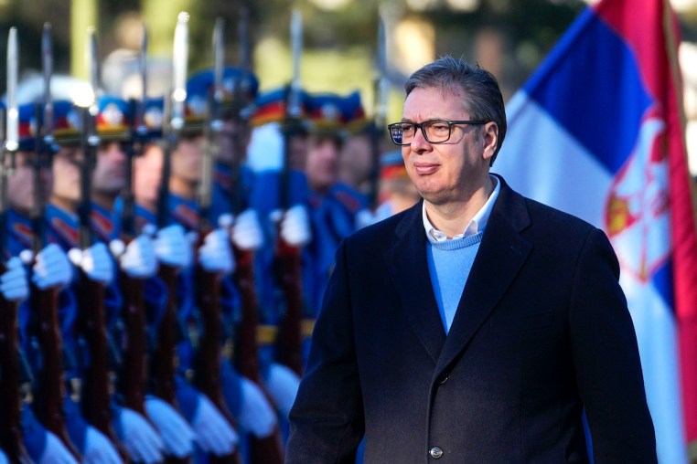 Serbia's President Aleksandar Vucic reviews the honor guard during a welcoming ceremony at the army barracks in Belgrade, Serbia, Tuesday, Jan. 30, 2024. 