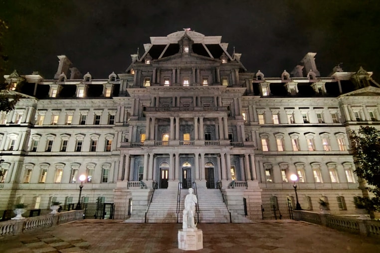 A newly-installed statue of Christopher Columbus standing in front of the Eisenhower Executive Office Building in Washington, on March 22, 2026.