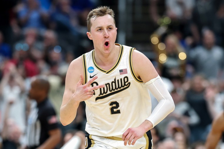Flethcher Loyer on the basketball court.