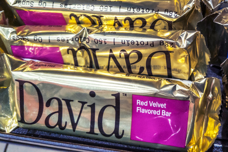 David brand protein bars stacked on a store shelf