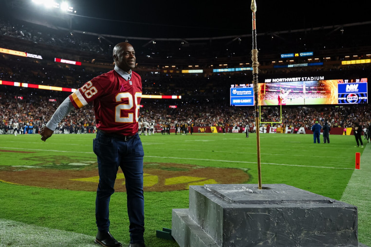 LANDOVER, MD - OCTOBER 13: Former Washington Redskins cornerback Darrell Green #28 stands on the field during the second half of the game between the Washington Commanders and the Chicago Bears at Northwest Stadium on October 13, 2025 in Landover, Maryland. (Photo by Scott Taetsch/Getty Images)