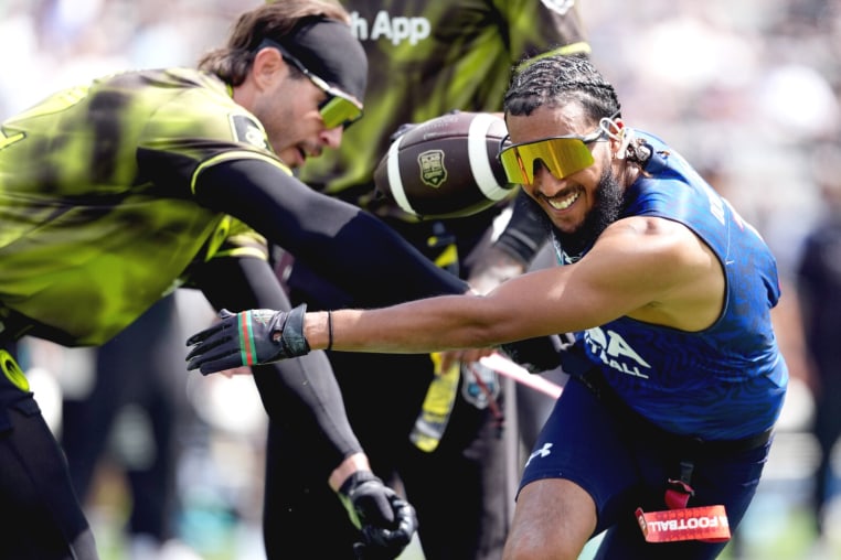 LOS ANGELES, CALIFORNIA - MARCH 21: Housh Doucette #7 of the US Men's Flag Football Team runs the ball during the Fanatics Flag Football Classic at BMO Stadium on March 21, 2026 in Los Angeles, California. (Photo by Michael Owens/Getty Images for OBB Media - FANATICS STUDIOS)