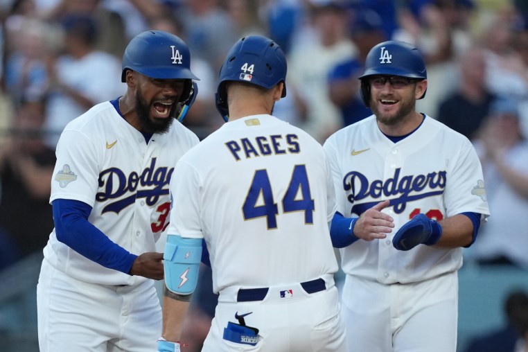 Mar 26, 2026; Los Angeles, California, USA; Los Angeles Dodgers outfielder Andy Pages (44) celebrates with outfielder Teoscar Hernandez (37) and infielder Max Muncy (13) at home plate after hitting a three run home run against Arizona Diamondbacks starting pitcher Zac Gallen (not pictured) during the fifth inning at Dodger Stadium. Mandatory Credit: Kirby Lee-Imagn Images