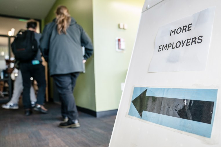 "More Employers" signage during a career fair.