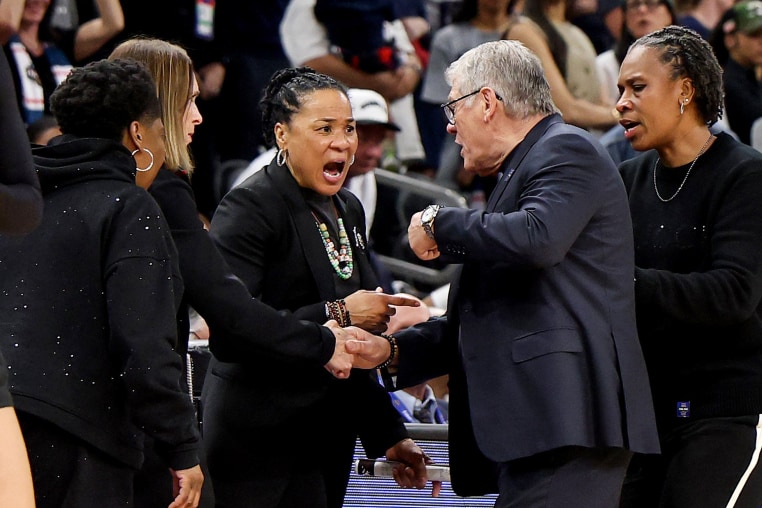 Dawn Staley of the South Carolina Gamecocks and head coach Geno Auriemma of the UConn Huskies.