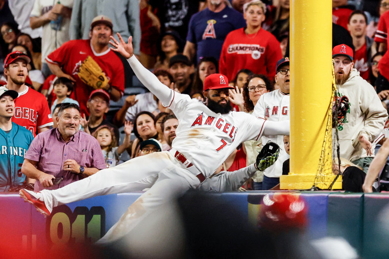 Jo Adell jumps into the crowd