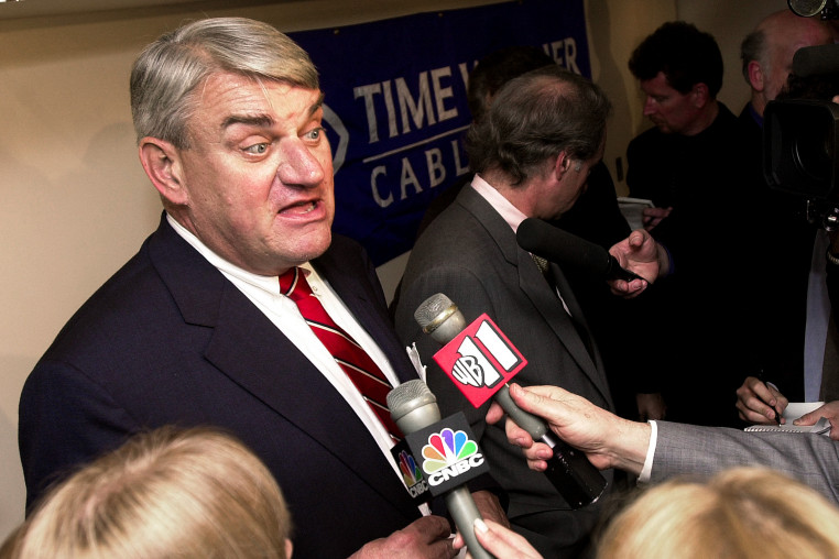 Joseph Collins discusses his company a news conference.