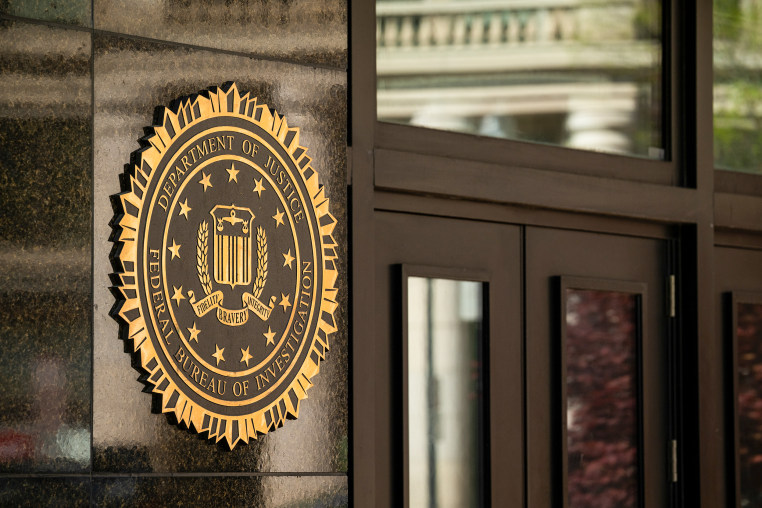 The Department of Justice seal on the J. Edgar Hoover Federal Bureau of Investigation building 