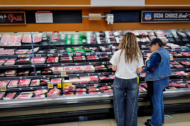 Customers shop for beef at a grocery store in Los Angeles on April 6, 2026.