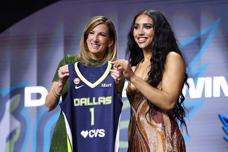 WNBA Commissioner Cathy Engelbert poses for a photo with Azzi Fudd after being drafted first overall by the Dallas Wings during the 2026 WNBA draft on April 13, 2026 at The Shed in New York