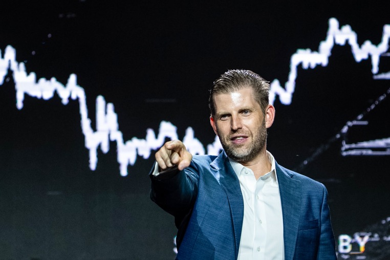 Eric Trump points while speaking