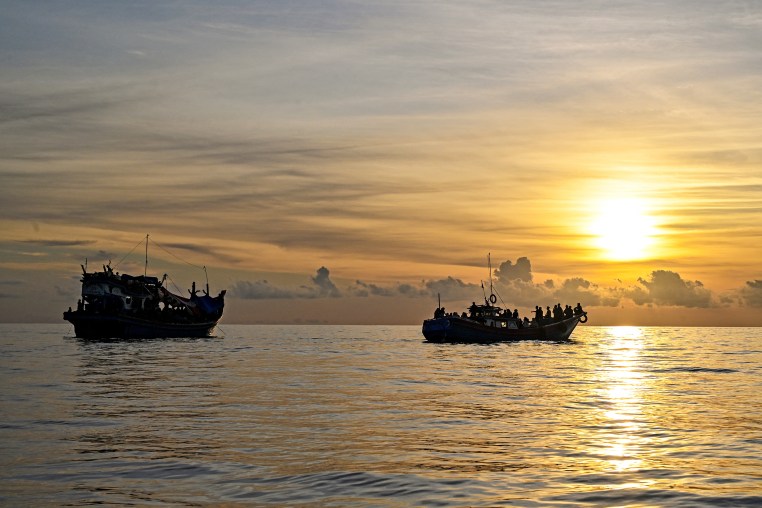 Image: A boat carrying Rohingya refugees