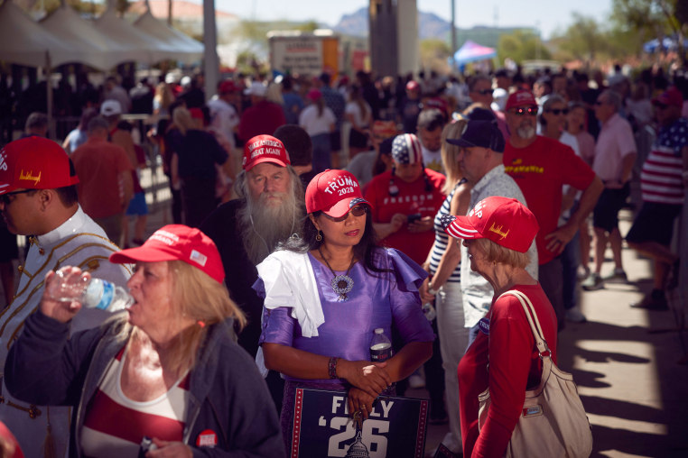 Guests wait in the entrance line for “Build the Red Wall” event hosted by Turning Point USA and Turning Point Action, and headlined by President Donald Trump at Dream City Church Phoenix, AZ, on April 17, 2026