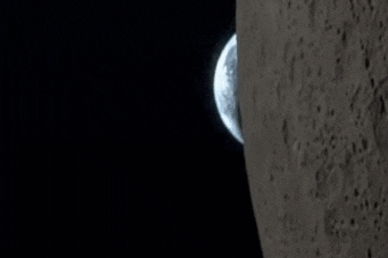 The Earth sets behind the moon in a video captured by NASA astronaut Reid Wiseman.