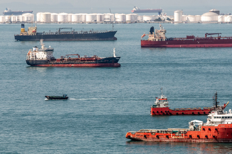Oil tank farm and ships off the coast of Singapore