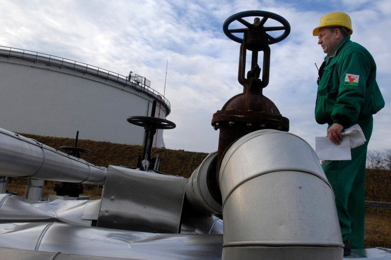 An engineer checks the receiving area of the Druzhba oil pipeline in Szazhalombata, Hungary, 
