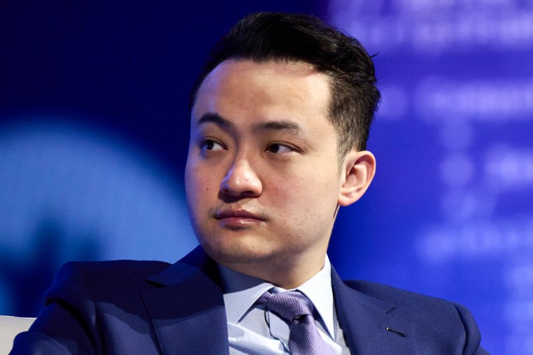 Justin Sun seated on a couch