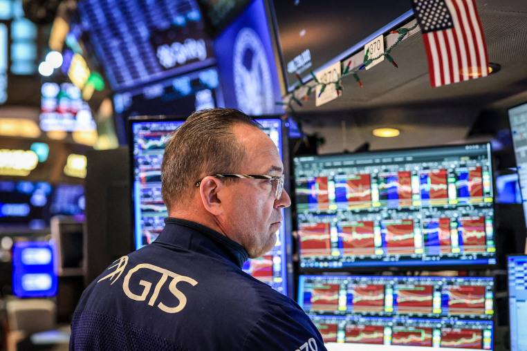 Image: A trader works on the floor of the New York Stock Exchange (NYSE) 