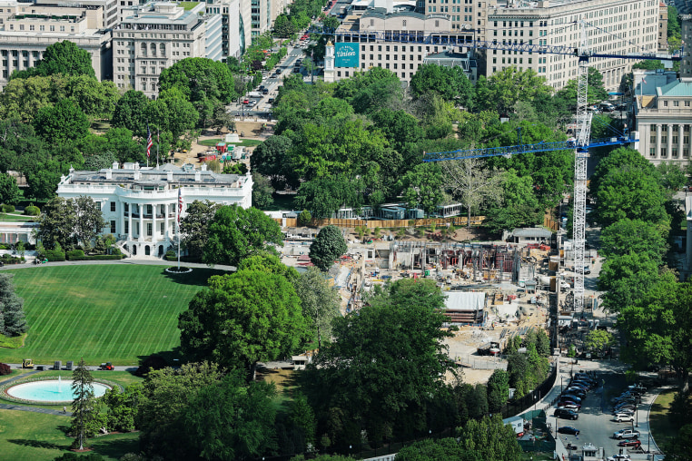 Construction cranes on the site of the proposed White House ballroom on April 17, 2026.