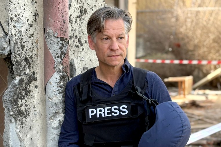 Correspondent Richard Engel in a press flack jacket and helmet.