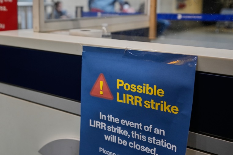 Image: A sign warns commuters of a potential Long Island Rail Road strike at Penn Station in New York.