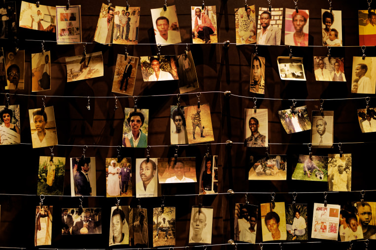 Family photographs of some of those who died hang on display in an exhibition at the Kigali Genocide Memorial centre in the capital Kigali, Rwanda.