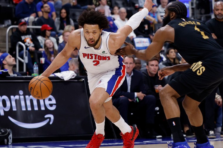 May 7, 2026; Detroit, Michigan, USA; Detroit Pistons guard Cade Cunningham (2) dribbles defended by Cleveland Cavaliers guard James Harden (1) in the second half during game two of the second round of the 2026 NBA Playoffs at Little Caesars Arena. Mandatory Credit: Rick Osentoski-Imagn Images
