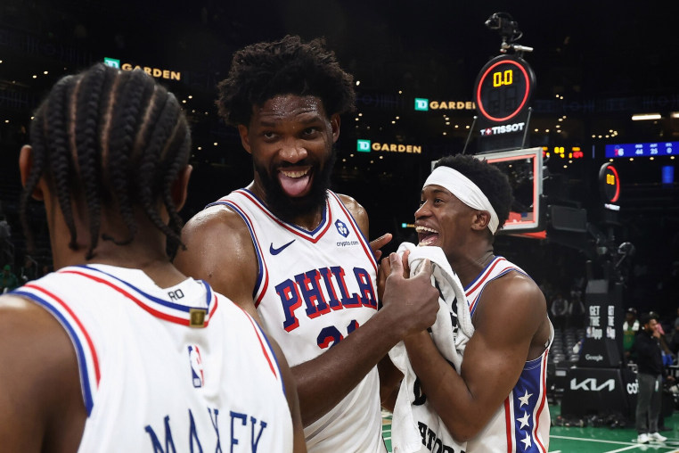 May 2, 2026; Boston, Massachusetts, USA; Philadelphia 76ers center Joel Embiid (21) celebrates with guard Tyrese Maxey (0) and guard Vj Edgecombe (77)] following their win over the Boston Celtics in game seven of the first round of the 2026 NBA Playoffs at TD Garden. Mandatory Credit: Winslow Townson-Imagn Images