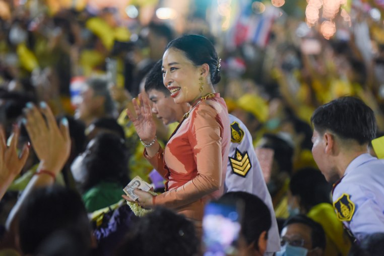 Princess Bajrakitiyabha Mahidol waves at the royalist