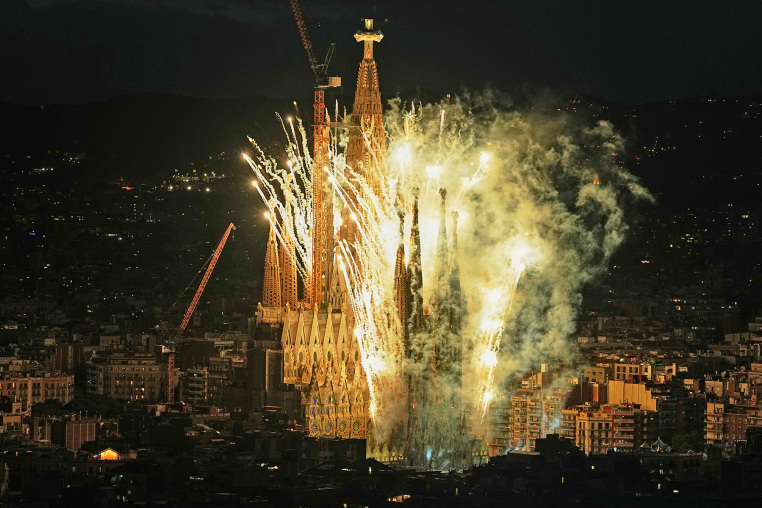 Fireworks engulf Antoni Gaudí's Basilica of the Sagrada Família after Pope Leo XIV blessed the newly completed central Tower of Jesus Christ in Barcelona, Spain, Wednesday, June 10, 2026. 